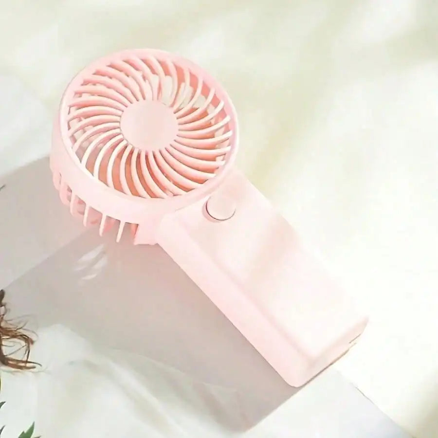 Mini ventilador de mano, portátil, ligero, alimentado por batería, con funcionamiento silencioso de alta velocidad, 4 colores, 1 ud.