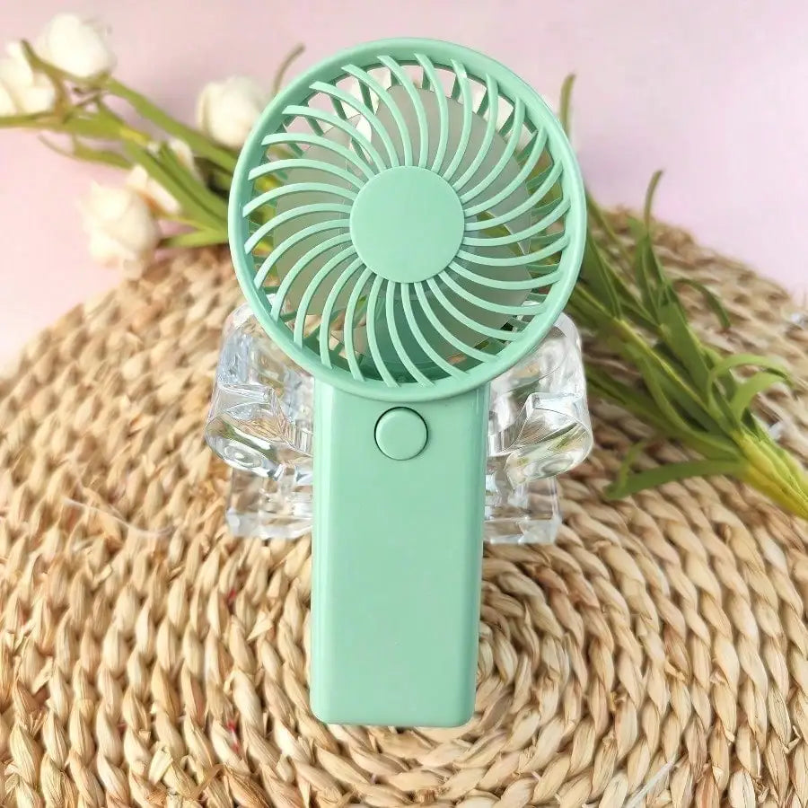 Mini ventilador de mano, portátil, ligero, alimentado por batería, con funcionamiento silencioso de alta velocidad, 4 colores, 1 ud.